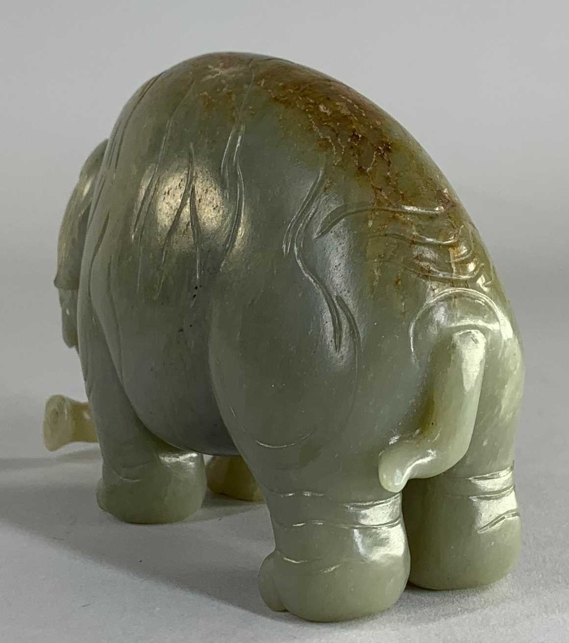 CHINESE CELADON JADE CARVING OF AN ASIAN ELEPHANT, late Qing Dynasty, standing with head lowered and - Image 9 of 17