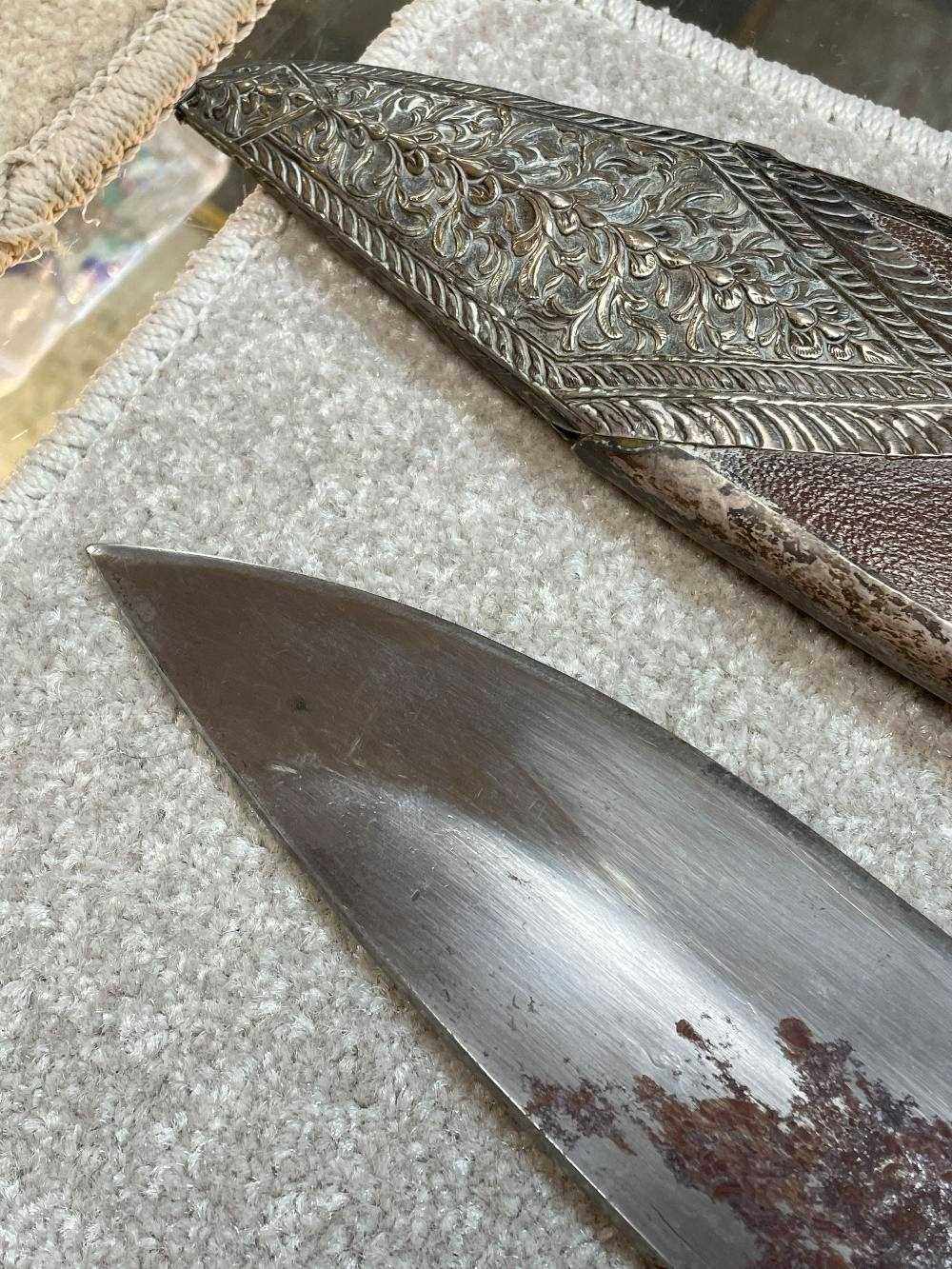 CEREMONIAL KUKRI, Nepal, 28cm poilished steel blade, floral embossed white metal hilt and pommel, - Bild 8 aus 16