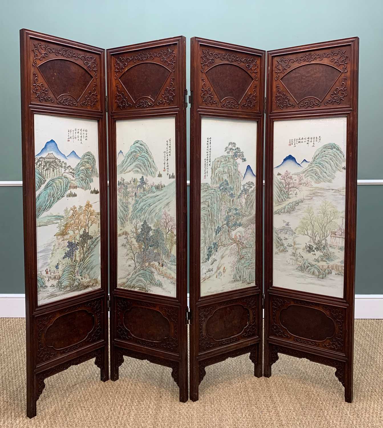 CHINESE PORCELAIN MOUNTED FOUR-LEAF HARDWOOD SCREEN, late Qing Dynasty, each leaf mounted with a