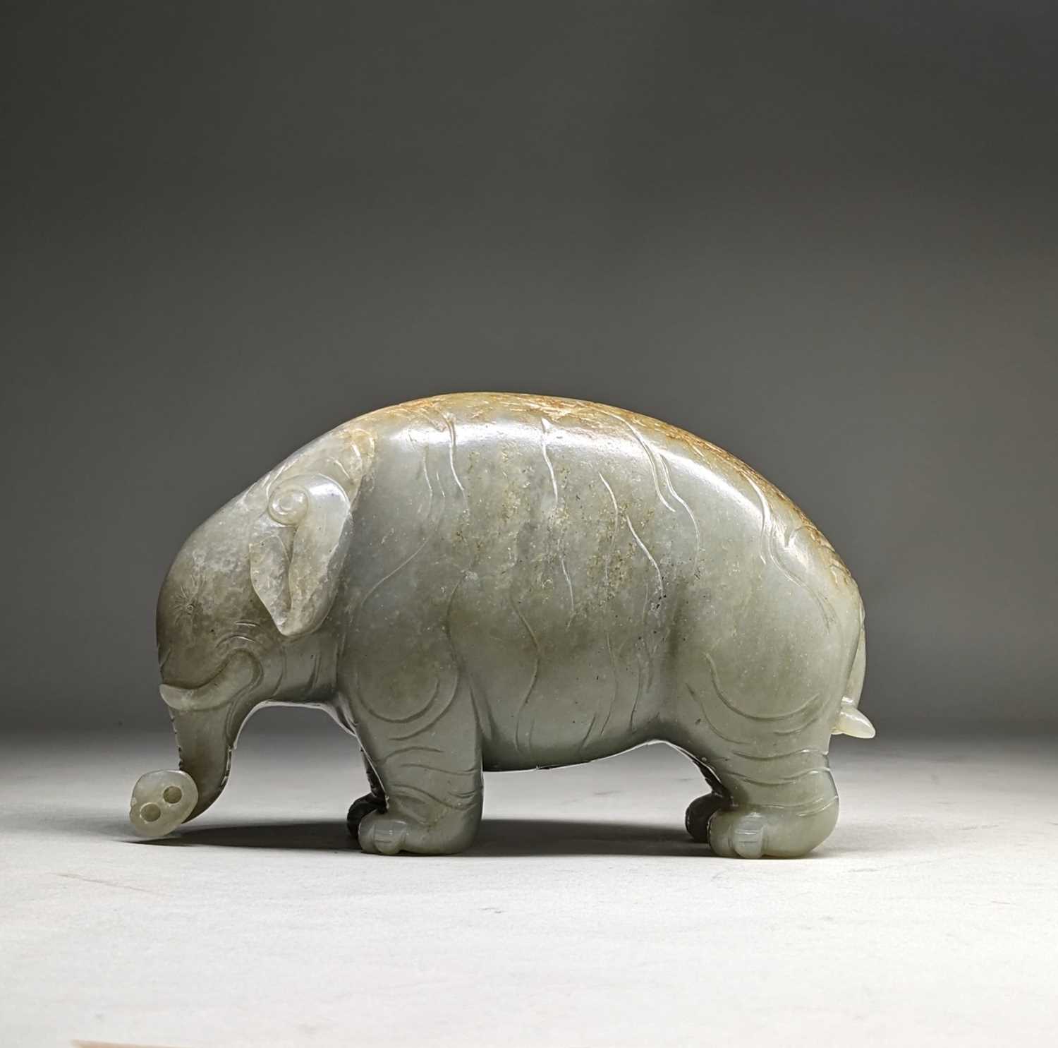CHINESE CELADON JADE CARVING OF AN ASIAN ELEPHANT, late Qing Dynasty, standing with head lowered and - Image 4 of 17