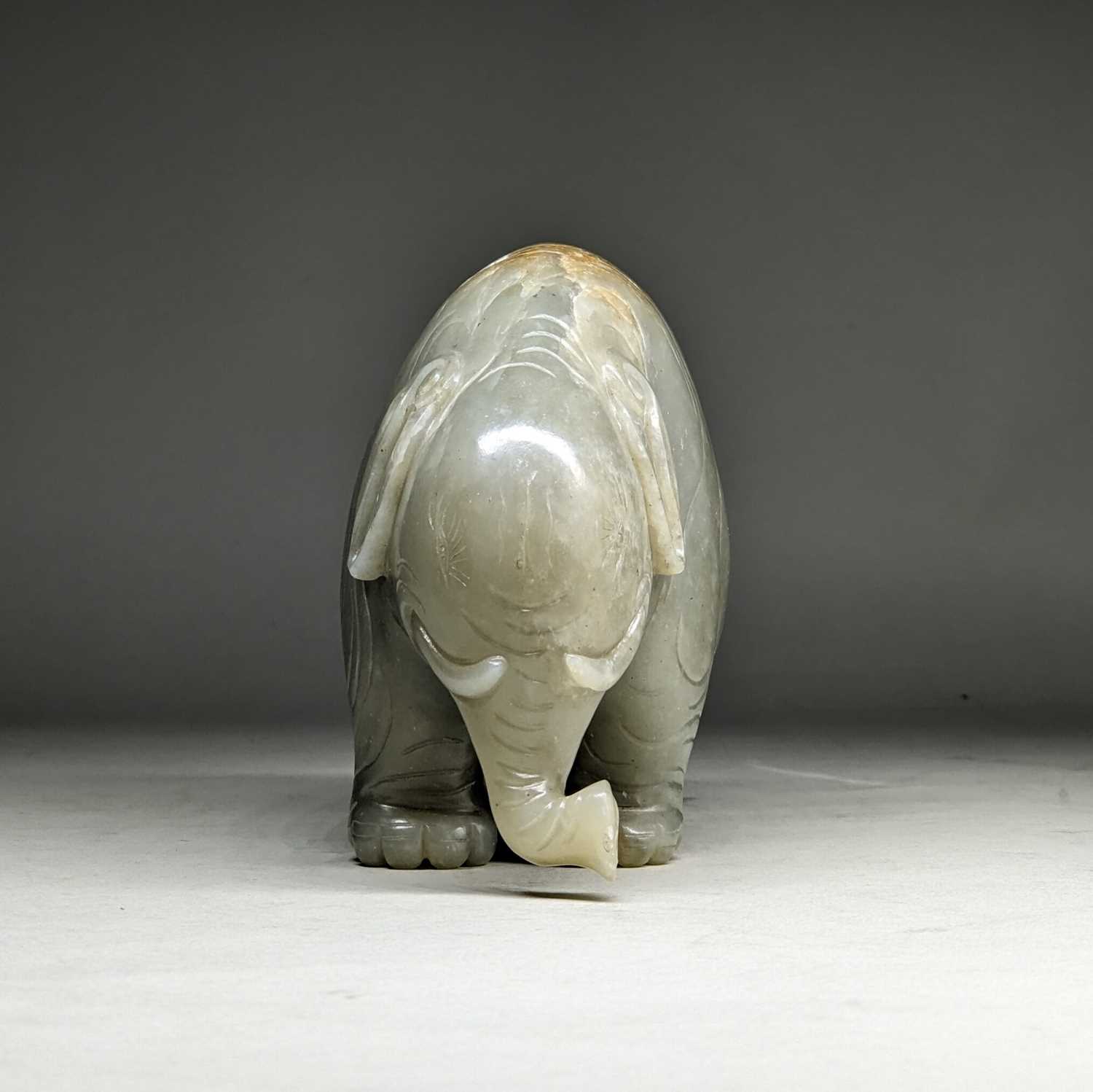 CHINESE CELADON JADE CARVING OF AN ASIAN ELEPHANT, late Qing Dynasty, standing with head lowered and - Image 3 of 17