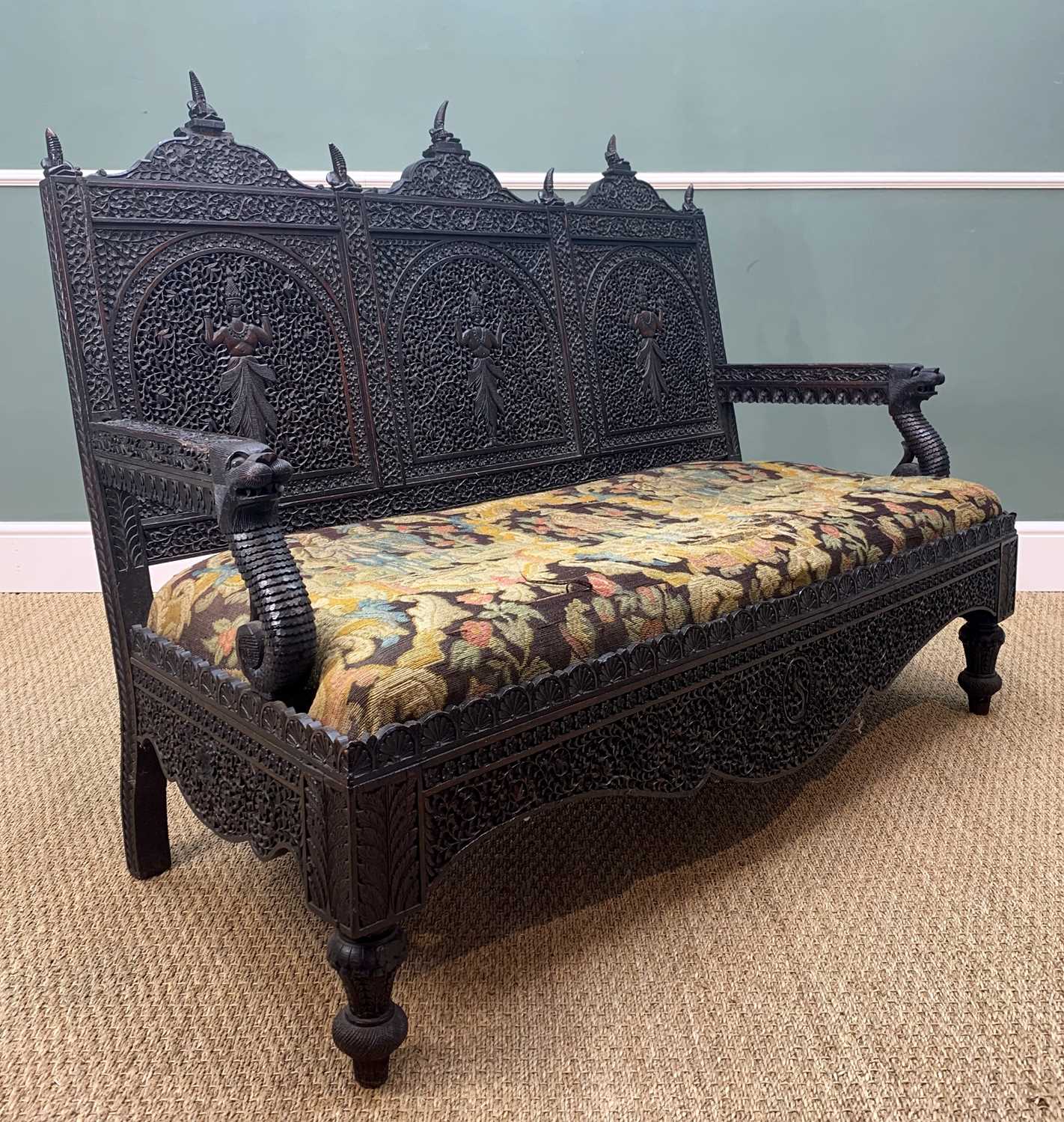 ANGLO-INDIAN CARVED HARDWOOD SETTEE, Bombay c. 1900, triple panelled backcented with figures, seated - Image 7 of 8