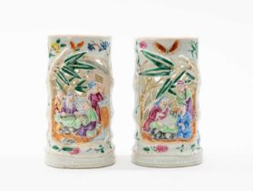 PAIR CHINESE FAMILLE ROSE INCENSE (JOSS) STICK HOLDERS, each modelled as a section of bamboo,