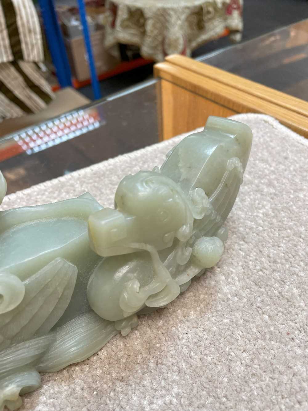 CHINESE CELADON JADE CARVING OF MANDARIN DUCKS, late Qing Dynasty, swimming on a pond with stems - Image 15 of 19