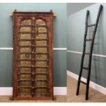 RAJASTHAN TEAK DOOR & INDONESIAN LADDER, 20th Century, the double door with horse-and-rider embossed