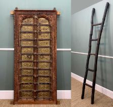 RAJASTHAN TEAK DOOR & INDONESIAN LADDER, 20th Century, the double door with horse-and-rider embossed