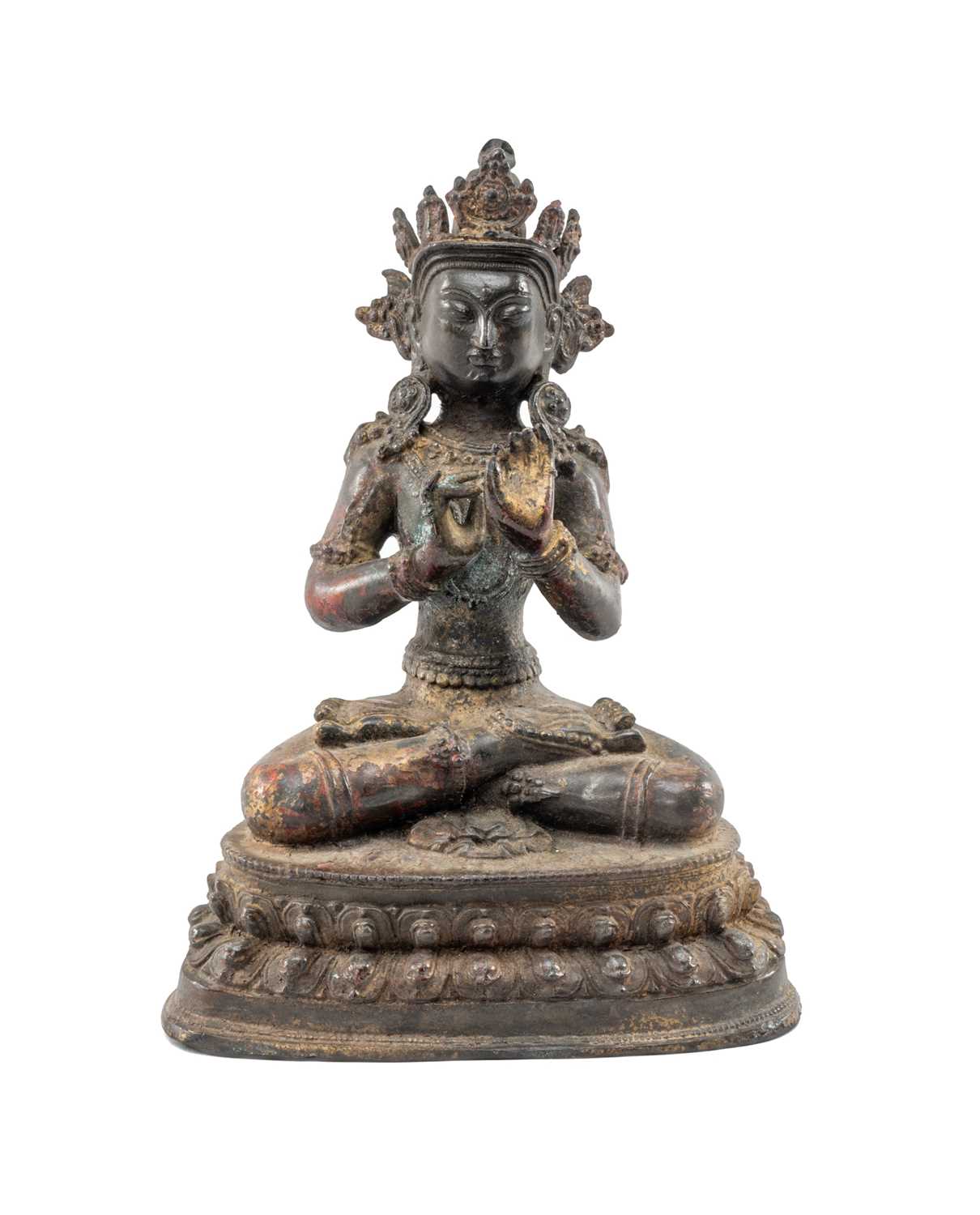 CHINESE BRONZE FIGURE OF GUANYIN, probably Late Ming Dynasty, seated in vajrasana on a double