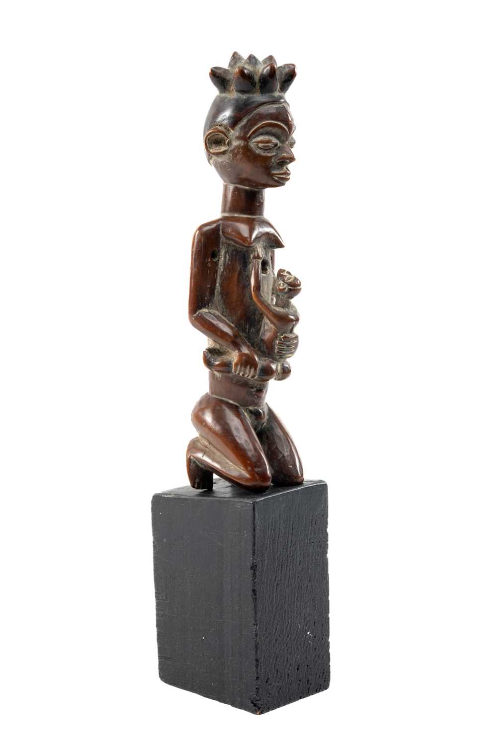 ZOMBO MATERNITY FIGURE, D.R.Congo, the kneeling figure holding straddling infant to abdomen,