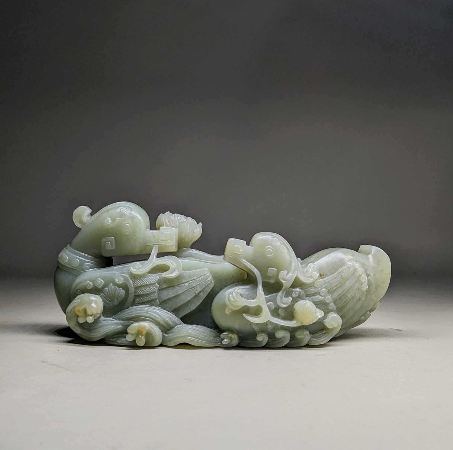 CHINESE CELADON JADE CARVING OF MANDARIN DUCKS, late Qing Dynasty, swimming on a pond with stems - Image 4 of 19