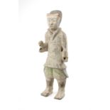 CHINESE PAINTED GREY POTTERY FIGURE OF AN ATTENDANT, Han Dynasty (206BC-AD220), with wraped jacket