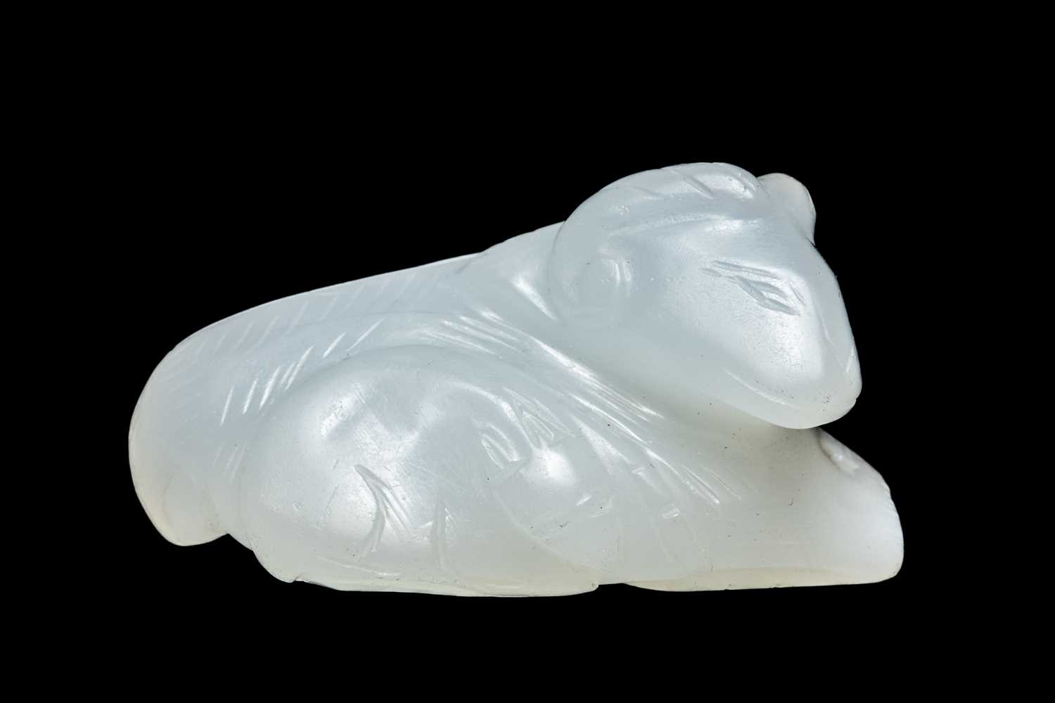 CHINESE WHITE JADE CARVING OF GOAT & KID, late Qing Dynasty or later, the recumbent adult beside