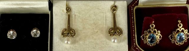 THREE PAIRS OF 9CT GOLD EARRINGS including aquamarine drop with openwork surround, pearl drop and