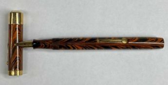 WATERMAN VINTAGE FOUNTAIN PEN, orange marbled body and cap with 9ct gold band and end cap, the nib