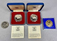 TWO SILVER PROOF CROWNS commemorating Queen's Silver Jubilee 1977, each 28.276gms, encapsulated