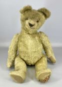 MOHAIR & STRAW FILLED TEDDY BEAR, early 20th C., with jointed limbs and head, 76cms (h)