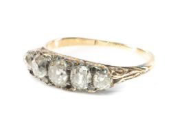 ANTIQUE YELLOW METAL FIVE STONE DIAMOND RING, the five graduated old cut stones measuring 0.75ct