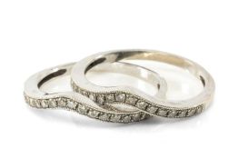 PAIR OF 14K WHITE GOLD DIAMOND CHIP RINGS, of wishbone design, ring size O 1/2, 3.8gms gross (2)