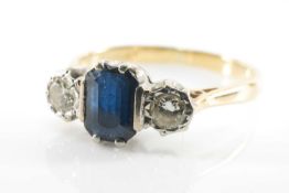 18CT GOLD & PLATINUM THREE STONE DIAMOND & SAPPHIRE RING, the central sapphire flanked by two