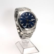 A boxed Tissot Powermatic 80 Silicium watch, the blue dial with baton hour markers and date apert...