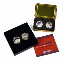 A pair of boxed sets of silver medallions. One set commemorating the Queen Mary and Queen Mary 2 ...