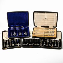 A cased set of six silver teaspoons; another two cased sets of six silver teaspoons, a cased set ...