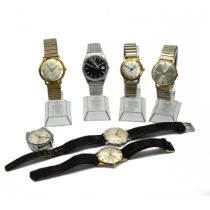 A collection of gentleman’s wrist watches, brands include Seiko; Nivada; and Caravelle, some
on b...