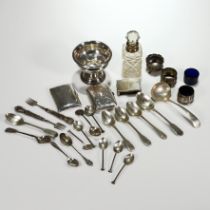 A collection of silver items, comprising; a small bowl; a silver mounted glass scent bottle; two ...