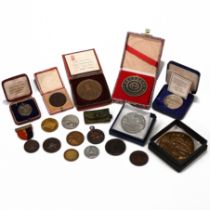 A varied grouping of medallions dating from the Victorian period to the 1960's to include: Royal ...