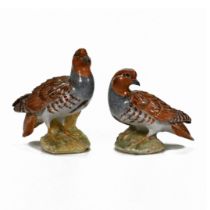 A pair of white glazed, red clay quails modelled by Lady Anne Gordon and bearing her monogram and...