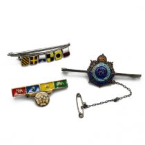 A Naval signalling flags brooch, stamped ’Silver’; a silver and enamel sweetheart brooch; and a s...