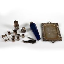 A miniature tray, with six mugs, a jug and a barrel on stand, all unmarked; with a small folding ...