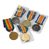 A group of five medals belonging to three different individuals for service in the First World Wa...