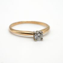 A single stone diamond ring, stamped ‘14K’, the brilliant cut weighing 0.2 carats estimated, fing...