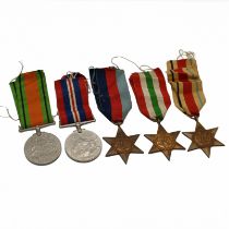 A group of five medals awarded for service in the Second World War comprising 1939-1945 Star, Afr...