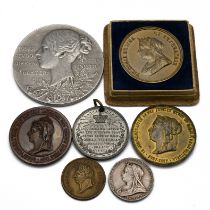 A selection of Victorian and earlier medallions to include: an 1821 George IV unofficial coronati...