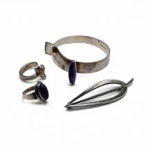 A Kupittaan Kulta amethyst set bangle, stamped marks; an N E From amethyst ring; a Just Andersen ...