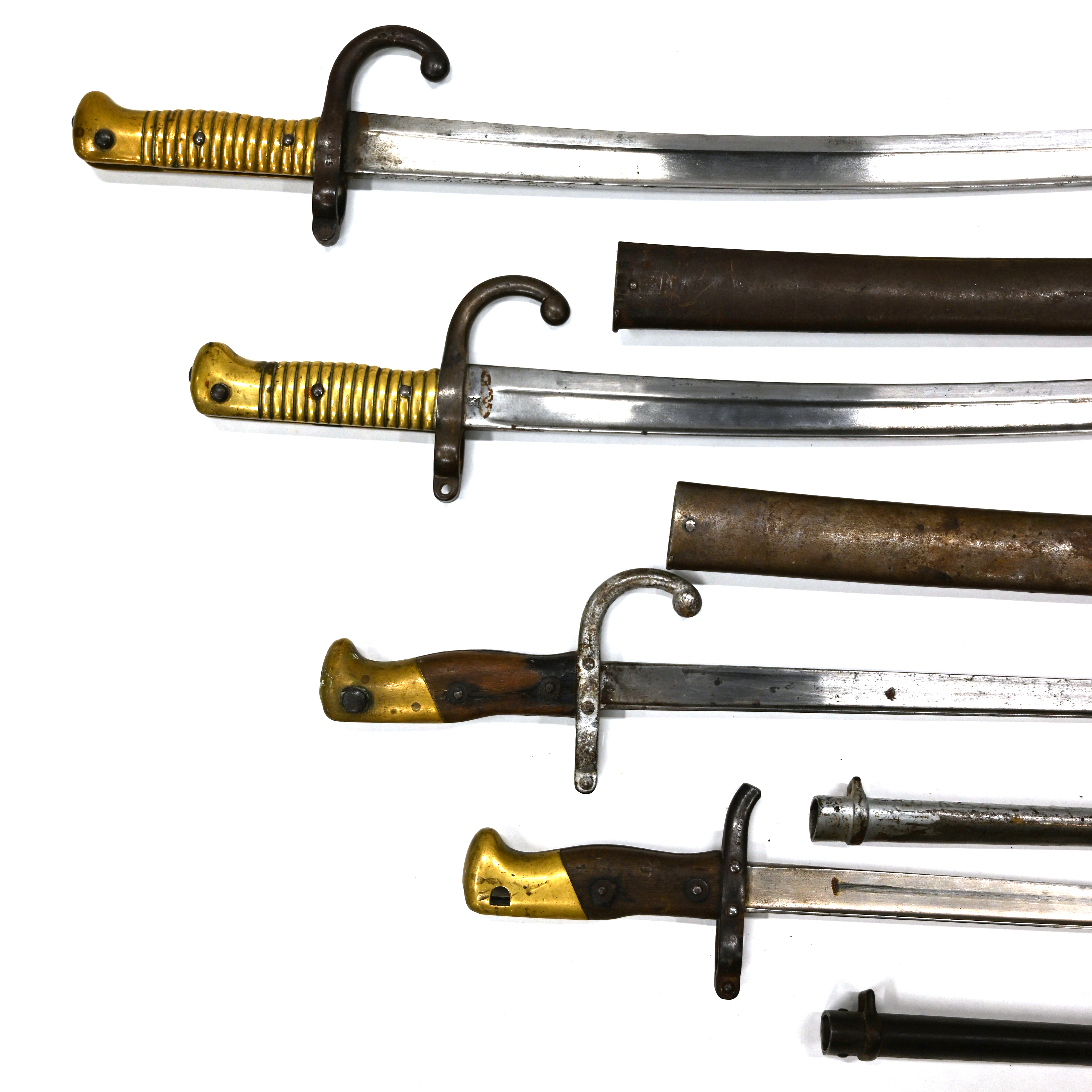 A French Chassepot bayonet with Yataghan blade and scabbard, 1869 with registration numbers to hi...