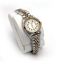 Rolex, Oyster Perpetual Datejust lady’s two colour bracelet watch with later diamond and sapphire...