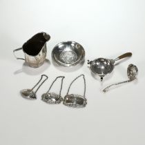 A good Victorian silver sifting spoon, John Figg, London 1852, 10cm long, 33 grams gross; a Victo...