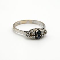 A sapphire and diamond dress ring, the white metal mount stamped ‘585’, finger size P, 2.7 grams ...