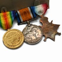 A trio of World War One medals to include the 1914-15 Star, Silver War Medal and Victory Medal as...