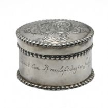 A Dutch box, with stamped marks, circa 1900, circular outline, the pull off cover embossed with a...