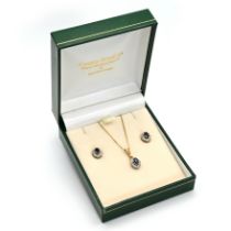 A boxed 9ct gold matching earrings and necklace. (3)
