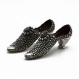 A matched pair of silver miniature shoes, possibly pin cushions, no makers mark detected, Birming...