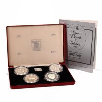 A set of four sterling silver crowns comprising the 1972 wedding anniversary crown, 1977 silver j...