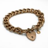 A bracelet, of hollow curb links, stamped ‘9ct’ to the first link, on a padlock clasp, 21.8 grams...