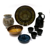 A quantity of Cricklade pottery, to include a green ground platter 31cm wide, a mead set of 4 cup...