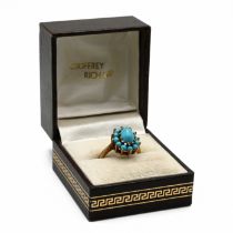 A 9 carat gold turquoise cluster ring, finger size N, 3.6 gram gross.