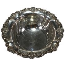 Gorham, an American bowl, with stamped marks, shell and scroll border, monogrammed, 26.5 cm diame...