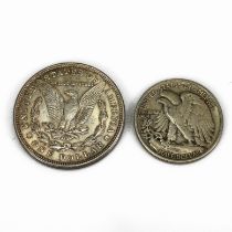 A pair of United States .900 silver coins. 1921 Silver 'Morgan' Dollar and 1939 Silver 'Walking L...